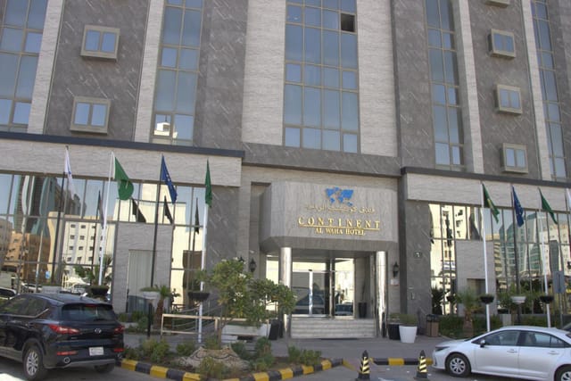 Modern hotel entrance at Continent Al Waha, ideal for corporate events and conferences.