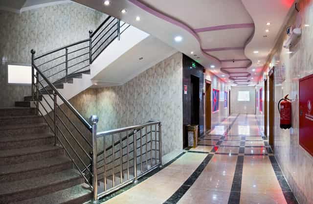 Professional corridor in Al Farhan Suites Ishbillia for conferences and events.