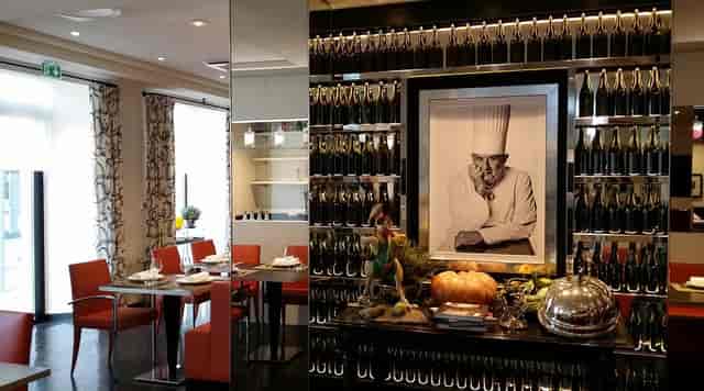 Elegant dining space at L'Institut Restaurant for upscale meetings and events.