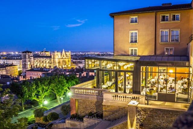 Elegant restaurant terrace in Les Terrasses de Lyon, perfect for upscale evening events.