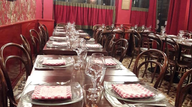 Elegant dining setup at Le Bouchon des Filles for intimate events and celebratory dinners.