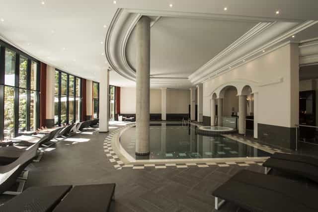 Serene spa environment at Hôtel Le Pavillon, ideal for wellness retreats and corporate events.