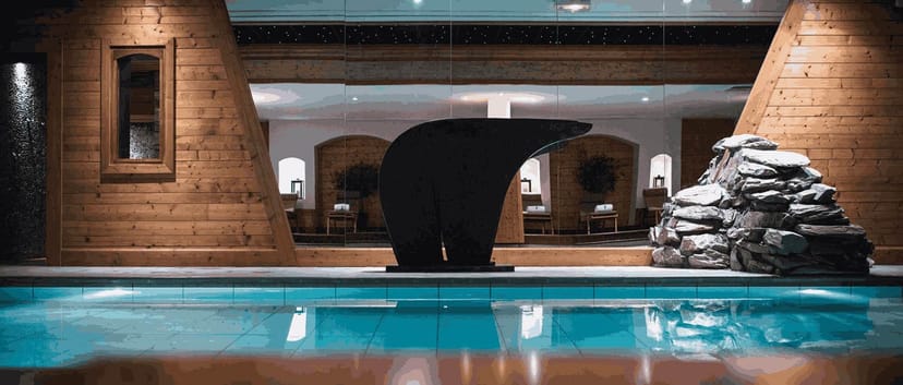 Seminar Room at Hôtel & Spa Les Barmes de l'Ours with bear sculpture for luxury events.