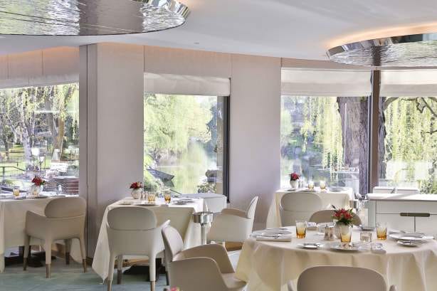 Elegant dining space at Auberge de l'Ill for executive meetings and intimate events.