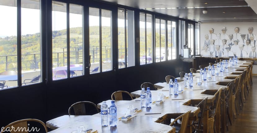 Spacious meeting room at l'Atelier, Ermitage Hotel, designed for corporate retreats.