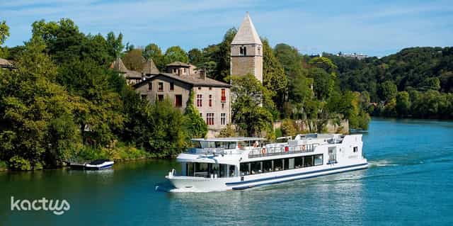 Modern riverboat in Lyon's scenic setting for corporate retreats and social gatherings.