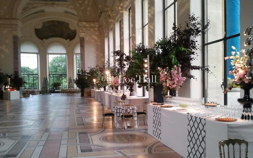 Elegant event space in Petit Palais with floral decor, perfect for weddings and receptions.
