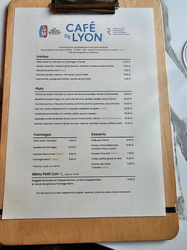 Café de Lyon menu showcasing diverse catering options for events and budget planning.