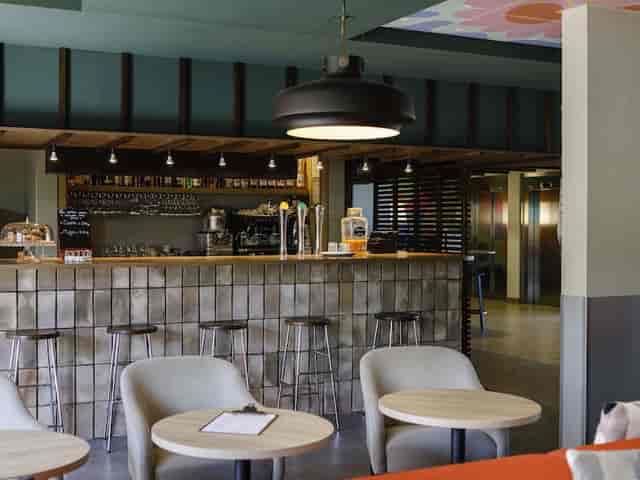 Contemporary café in Salle Lionel Terray, ideal for meetings and networking events.