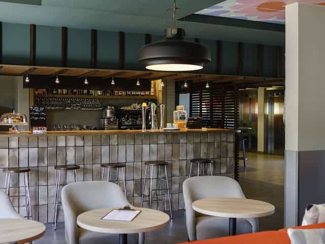 Contemporary café in Salle Lionel Terray, ideal for meetings and networking events.