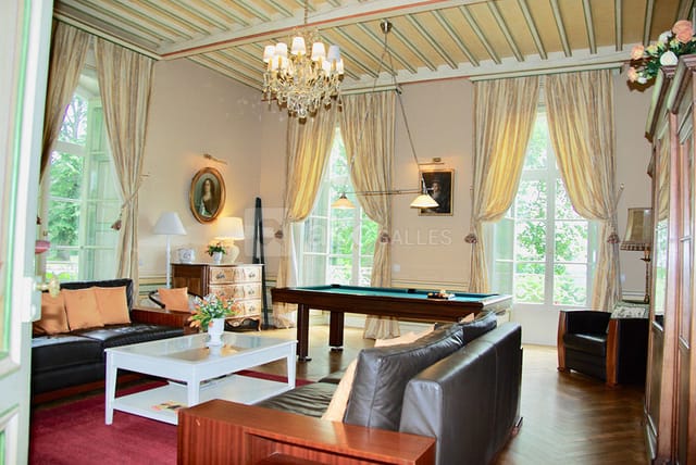 Stylish Château des Gaudras reception hall for conferences and retreats with pool table.