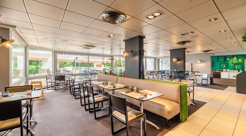 Modern dining space at Jardin & Company, perfect for corporate meetings and events.