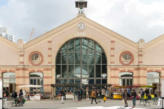 Performing arts theater in CENTQUATRE-PARIS with modern design for events and exhibitions.