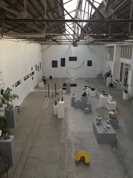 Exhibition Hall in L'USINE: spacious, minimal design for events and art exhibitions.