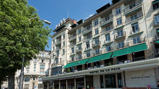 Elegant Hôtel de la Paix function room with classic facade for upscale events.