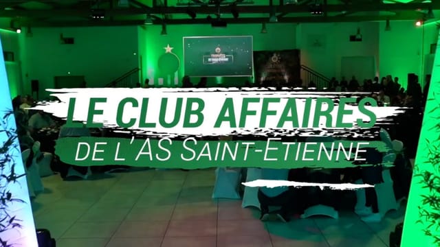 Corporate event at Club des Étoiles with green lighting and branded backdrop.