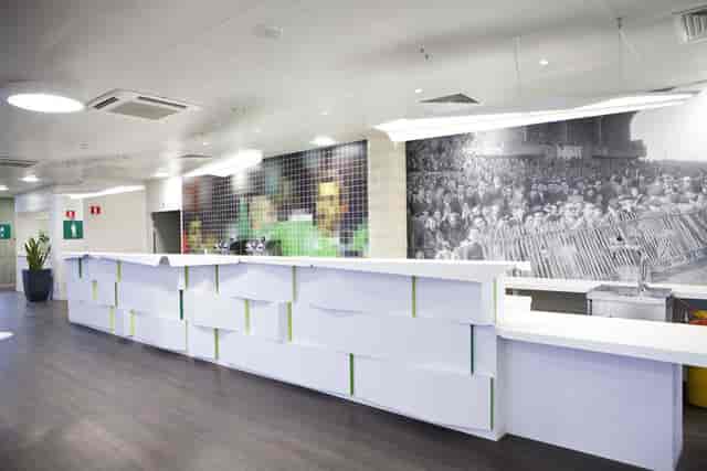 Modern event check-in desk with sleek design at Salons du Stade GG, perfect for conferences.