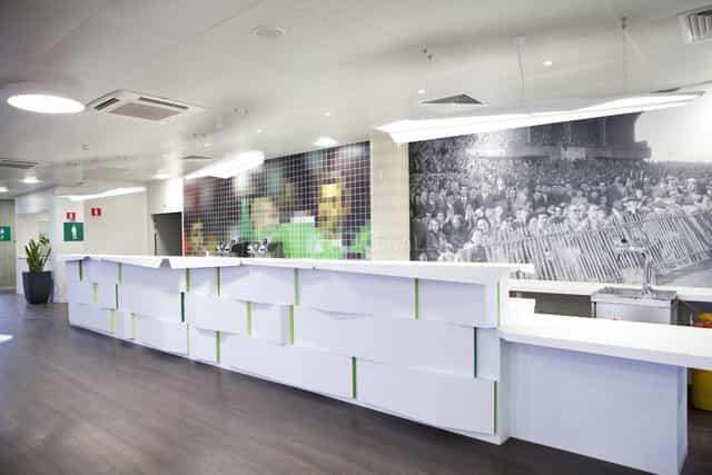 Modern event check-in desk with sleek design at Salons du Stade GG, perfect for conferences.