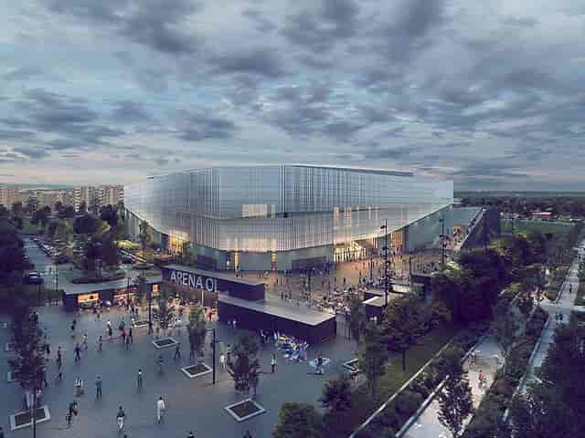 Grand Hall at OL Vallée, modern venue with glass façade for events and conferences.