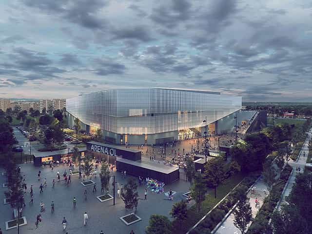 Grand Hall at OL Vallée, modern venue with glass façade for events and conferences.