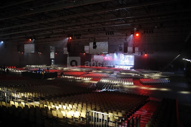 Paul Bocuse at Eurexpo Lyon, corporate event with illuminated stage and seating.