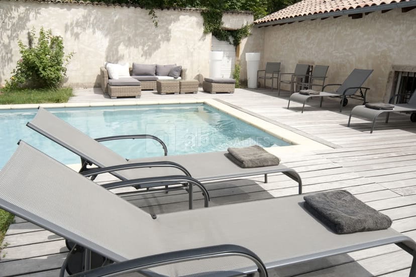 Serene poolside terrace at L'Hermitage de Moly for events and gatherings.