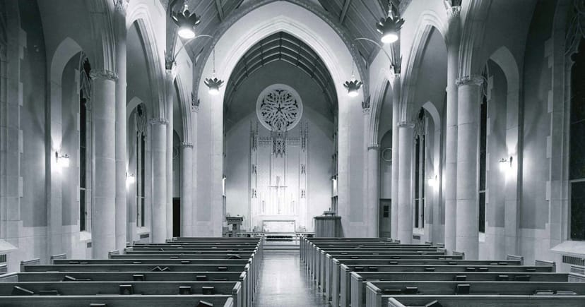 Cox Chapel interior with vaulted ceilings, perfect for weddings and spiritual events.