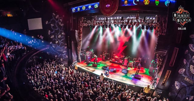 Vibrant concert at Music Hall, House of Blues Dallas with dynamic lighting and diverse crowd.