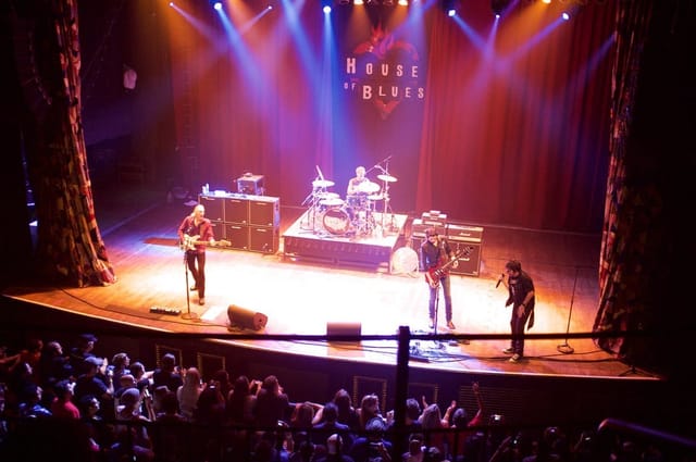 Live music event at House of Blues Dallas with dynamic lighting and vibrant atmosphere.