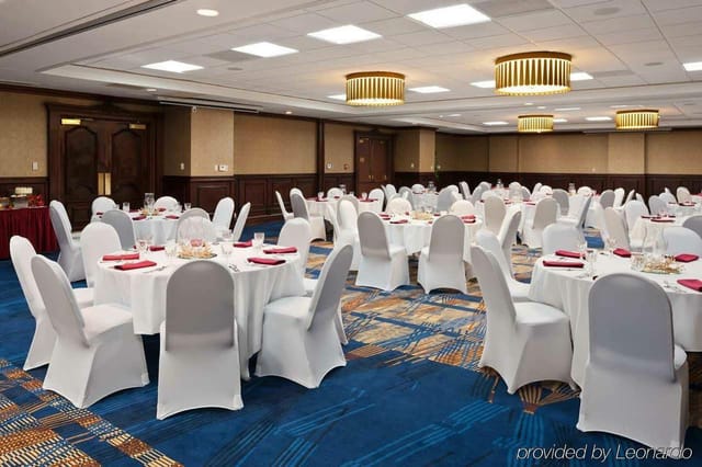 Spacious banquet hall in Embassy Suites Dallas, ideal for weddings and corporate meetings.