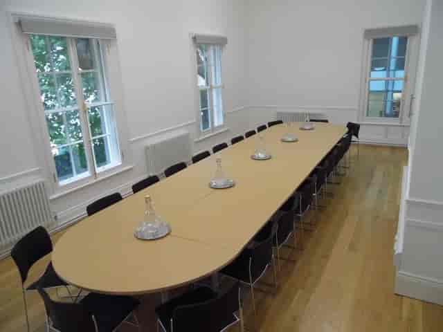 F11 Meeting Room at Friends' Meeting House, spacious with natural light, ideal for conferences.