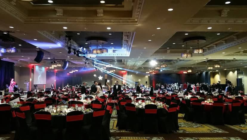 Elegant Bayou City Event Center ballroom with round tables for celebrations.