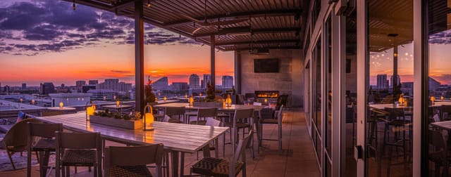 "Rooftop Lounge in Upside West Village, stylish seating for sunset cocktails and events."