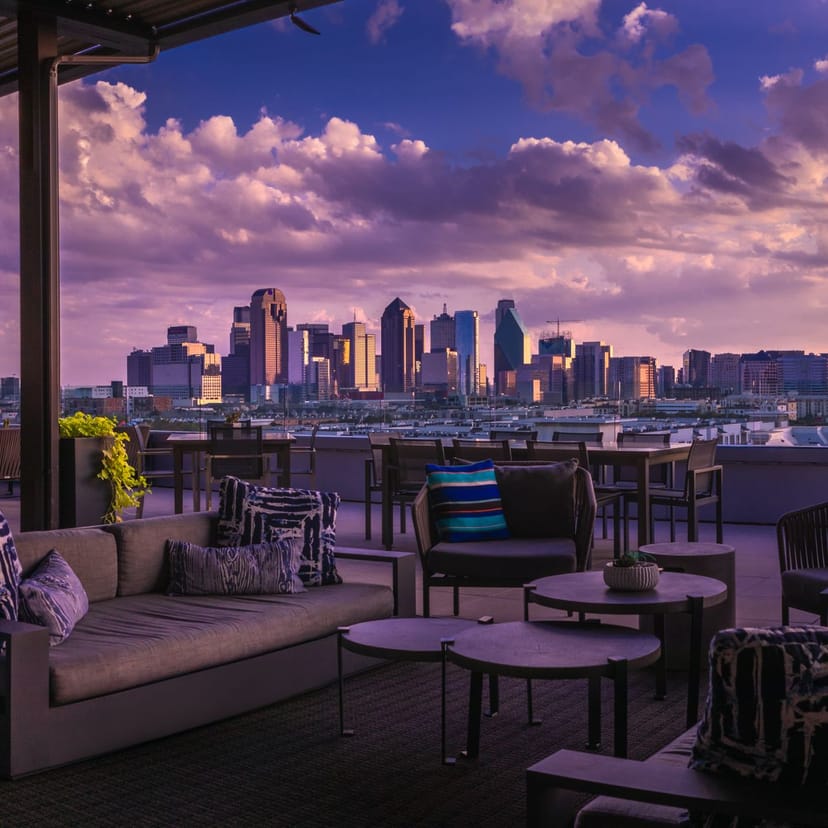Stunning Rooftop Lounge with skyline view, perfect for upscale events and celebrations.