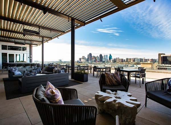 Stylish Upside West Village rooftop lounge with skyline views for upscale events and networking.