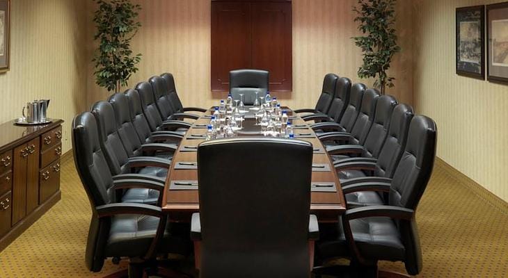 Conference room at DoubleTree Hilton Dallas, featuring a long table for productive meetings.