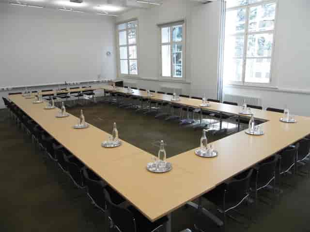 Upper Hall in Friends' Meeting House, U-shaped setup for collaborative discussions.