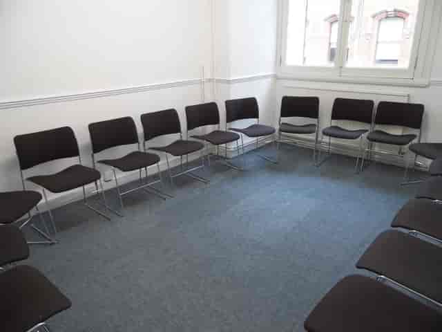 F14 Meeting Room with circular chair setup for collaborative discussions and workshops.