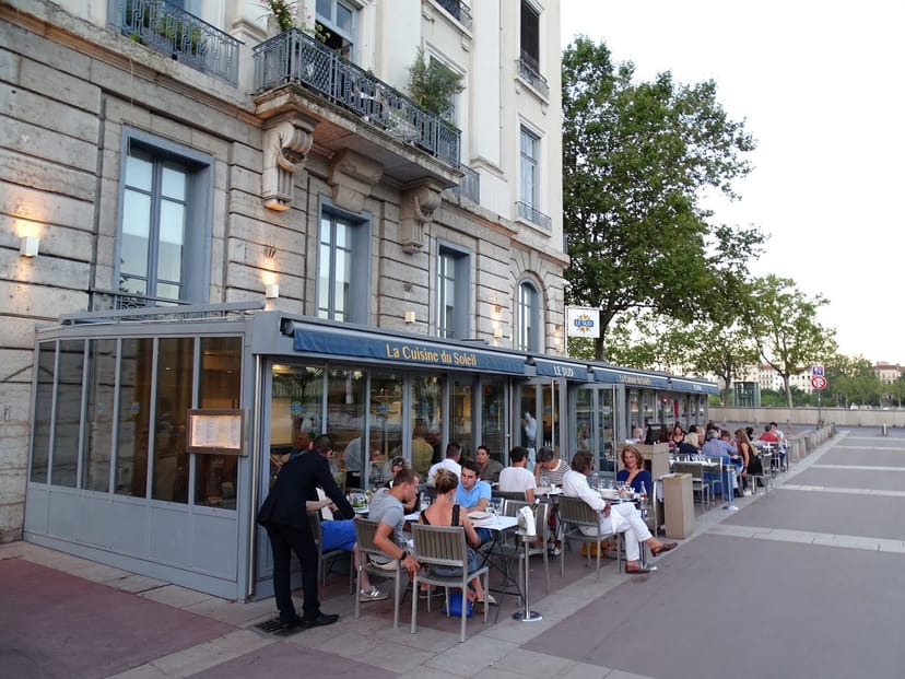 Outdoor dining at Brasserie Le Sud, perfect for casual meetings and summer events.