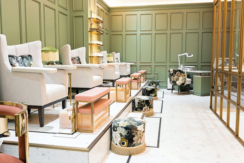 Chic salon at The Lunatic Fringe with plush seating, perfect for wellness events.