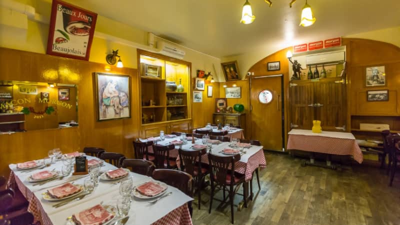 Cozy rustic restaurant interior with wooden finishes for intimate dining events.
