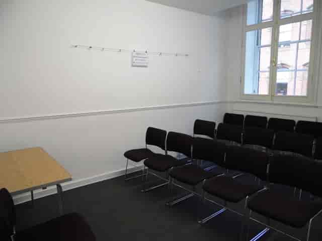 F15 Meeting Room at Friends' Meeting House, minimalistic setup for workshops and gatherings.