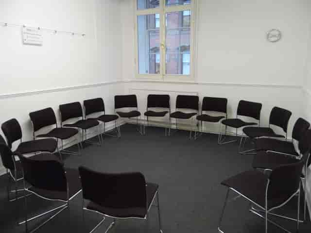 F15 Meeting Room at Friends' Meeting House, circular setup for workshops and discussions.