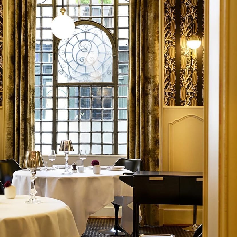 Elegant dining space at La Mère Brazier for intimate corporate events and meetings.