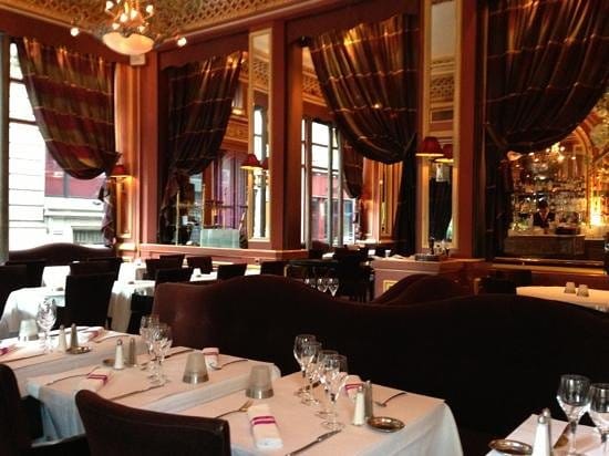 Elegant dining at Grand Café des Négociants, perfect for upscale events and intimate meetings.