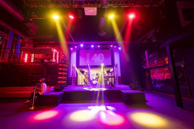 Vibrant nightclub in Docks 40 with dynamic lighting for concerts and corporate events.