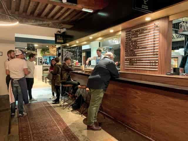 Cocktail bar in Food Traboule, vibrant venue ideal for networking and social events.