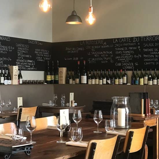 Cozy Café Terroir venue with chalkboard menu, perfect for wine tastings and gatherings.