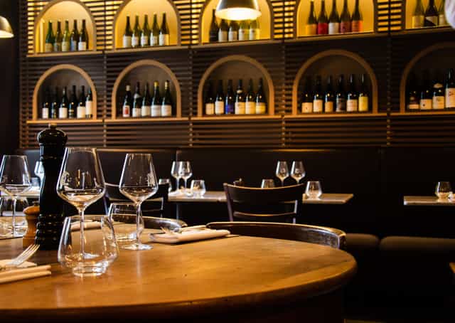Elegant restaurant setting at Café Terroir for wine-tasting and intimate dining events.