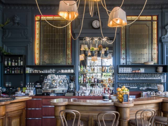 Elegant café bar at Grand Café de la Préfecture, perfect for meetings and networking.